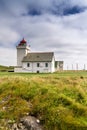 view of the historic Obrestad Lighthouse in Rogaland County in southern Norway Royalty Free Stock Photo