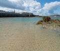 View of the historic old town of Saint-Malo with beach and coast at low tide