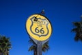 Route 66 road sign over the blue sky