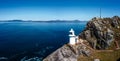 View of the historic Sheep`s Head Lighthouse on the Muntervary Peninsula in County Cork of Ireland