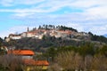 View of historic Stanjel town on a hill at Kras