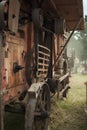 View of a historic threshing machine in operation while threshing wheat Royalty Free Stock Photo