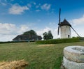 View of the historic windmill Moulin de Pierre and old millstones in Hauville in Normandy Royalty Free Stock Photo