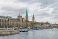 View of historic Zurich city center with famous Fraumunster and river Limmat at Lake Zurich on a cloudy day in winter, Switzerland Royalty Free Stock Photo