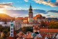 View of historical centre of Cesky Krumlov town on Vltava riverbank on autumn day overlooking medieval Castle, Czech Republic.