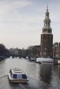 A view the historical city center from the Prince Hendrik lane with the Montelbaan tower in the background,Amsterdam,