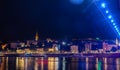 View of the historical city center and the Sava river in Belgrade, capital of Serbia at night. Shot with glares and Royalty Free Stock Photo