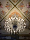 View of historical, old, classical chandelier and ornamental ceiling