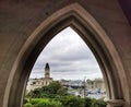 A view on historical town of Oamaru through churche's arch Royalty Free Stock Photo