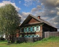 View of the historical traditional wooden house with carved windows. Village of Visim, Russia Royalty Free Stock Photo