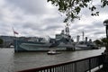 View on HMS Belfast, a famous WWII battleship, moored on the River Thames. Royalty Free Stock Photo