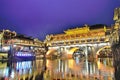 View of Hong bridge during twilight over the Tuojiang River Tuo Jiang River in Fenghuang old city Phoenix Ancient Town,Hunan