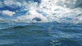 View of the horizon between restless water surface and the heavily clouded sky in the daytime