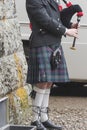 View of an hornpipe players in front of Dunrobin Castle