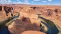 View of the Horseshoe Bend in Arizona, with the Colorado river and the sky in the background. Royalty Free Stock Photo