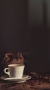 View of hot fresh cup of coffee with coffee beans in jute burlap bag in low light still life photography Royalty Free Stock Photo