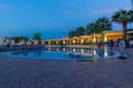 view at hotel resort with pool in Antalya Turkey on october 3rd 2018. Night shot with lights on in restaurant Royalty Free Stock Photo