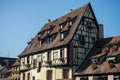 hotel sign on medieval building face in the street in Colmar - France