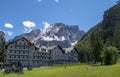 View of the hotel surrounded by trees at Lake Braies, Pragser Wildsee is a lake in the Prags Dolomites in South Tyrol, Italy Royalty Free Stock Photo