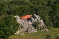 The view of the house built right next to the rocks from the top of the pyramids in Hattusha Yerkapi, Corum Turkey Royalty Free Stock Photo