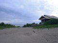 View of the house in the Dunes of white beach Green grass Royalty Free Stock Photo