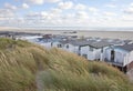 View at houses on beach with sea in IJmuiden
