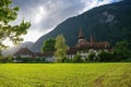 View of houses of old town and Brienz Church in sunset, Interlaken, Switzerland Royalty Free Stock Photo