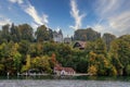 View of houses and waterfront buildings in the autumn. Take pictures while on a boat on a clear sky in Lucerne