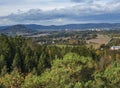 View from Hrabencina vyhlidka lookout on Novy bor town in luzicke hory, Lusatian Mountains with autumn colored deciduous and Royalty Free Stock Photo