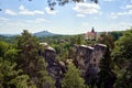 View of the Hruba Skala castle in the protected landscape area of Cesky Raj or Bohemian Paradise, with Trosky in the background Royalty Free Stock Photo