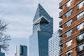 A view of 30 Hudson Yards through apartment buildings in Chelsea New York City Royalty Free Stock Photo