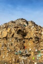 View of a huge stack of waste paper outdoors for recycled, vertical copy space Royalty Free Stock Photo