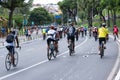 View of hundreds of cyclists taking a tour through the streets of the city of Salvador