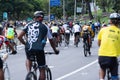 View of hundreds of cyclists taking a tour through the streets of the city of Salvador