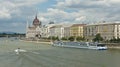 View of the Hungarian Parliament building on the bank of the Danube and a ship in Budapest, Hungary Royalty Free Stock Photo