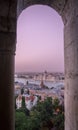 View of The Hungarian Parliament Building Through a Castle Window