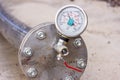 View of the hydrostatic testing of the polythene pipeline and manometer pressure gauge. Hydrostatic test is a way in which press Royalty Free Stock Photo
