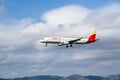 View of the Iberia, Airbus A321 plane landing at Barcelona, Spain airport