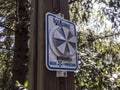 View of an Ice Alert warning sign on a wooden post in the historic Snoqualmie Falls Park Royalty Free Stock Photo