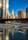 View of ice chunks floating under bridges on a frozen Chicago River in January Royalty Free Stock Photo
