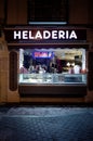 Ice cream shop window at night