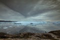 View on the icebergs under the dramatic sky