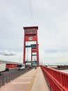 A view of the iconic red Ampera Bridge in Palembang, Indonesia. Royalty Free Stock Photo