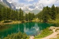 View of idyllic emerald alpine lake with matterhorn massif in the background in Valle d`Aosta, Italy