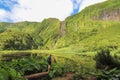 Several waterfalls that spring from the mountain and feed the lagoon, Poco da Alagoinh, Flores, Azores