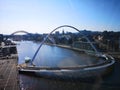 A view if the river Tyne including millennium bridge and the Tyne Bridge and the quayside