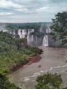 view of the iguaÃÂ§u falls with macuco safari boat. IguaÃÂ§u Falls is a set of about 275 waterfalls on the IguaÃÂ§u River.