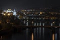 View Of Illuminated Bridges On The Vltava River In The Center Of Prague At Night At Czech Republic
