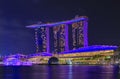 View of the illuminated famous luxury hotel, shopping center and casino Marina Bay Sands after sunset Singapore