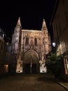 View of illuminated gothic church Basilique Saint-Pierre in the historic center of Avignon, Provence, France in the evening.